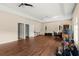 Bonus room with hardwood floors, neutral walls, recessed lights and large windows at 6234 Tremayne Dr, Mount Dora, FL 32757