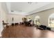 Spacious bonus room with high ceilings, hardwood floors, and natural light at 6234 Tremayne Dr, Mount Dora, FL 32757