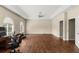 Large bonus room with high ceilings, ceiling fan and hardwood flooring at 6234 Tremayne Dr, Mount Dora, FL 32757