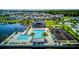 Community features a pool, clubhouse, and lake amenities, surrounded by picturesque homes and inviting green spaces at 625 Dogfish Ln, Debary, FL 32713