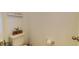 A close up of a toilet, toilet paper, and a sign that says 'live with a grateful heart' at 625 Dogfish Ln, Debary, FL 32713