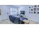 Well-lit living room with shuttered windows, comfortable seating, and curated wall art for a modern feel at 625 Dogfish Ln, Debary, FL 32713