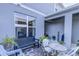 Inviting patio features a table, chairs, bench, and access to an outdoor area at 625 Dogfish Ln, Debary, FL 32713