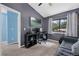 Cozy bedroom featuring a ceiling fan, tv, and comfortable seating at 752 Howland Ln # 114, Altamonte Springs, FL 32701