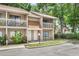 Charming two-story townhome with balconies, landscaping, and a well-maintained facade at 752 Howland Ln # 114, Altamonte Springs, FL 32701