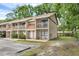 Charming townhouse featuring a private balcony and parking in a well-maintained community with mature trees at 752 Howland Ln # 114, Altamonte Springs, FL 32701