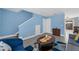 Inviting living room with modern decor and blue accent walls at 752 Howland Ln # 114, Altamonte Springs, FL 32701