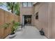 Cozy patio with seating and view of the sliding glass doors of this home at 752 Howland Ln # 114, Altamonte Springs, FL 32701