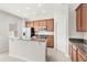 Bright kitchen features stainless steel appliances, granite countertops and center island with bar seating at 7715 Anselmo Ln, Windermere, FL 34786