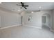 Living room with tile floors, vaulted ceiling and arched doorway at 8141 Golden Chickasaw Cir, Orlando, FL 32825