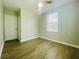 Comfortable bedroom with modern flooring, natural light, and spacious closet at 820 Maley St, Daytona Beach, FL 32114