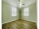 Inviting bedroom with modern flooring, ceiling fan, and plenty of natural light at 820 Maley St, Daytona Beach, FL 32114