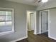 Hallway features updated flooring, fresh paint, and easy access to rooms at 820 Maley St, Daytona Beach, FL 32114