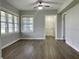 Cozy living room with ample natural light, modern flooring, and neutral paint at 820 Maley St, Daytona Beach, FL 32114
