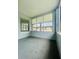 Enclosed porch providing clear views of the surrounding neighborhood at 820 Maley St, Daytona Beach, FL 32114