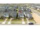 Aerial view of modern homes with manicured lawns in a residential community at 8964 Takeaway Way, Davenport, FL 33896
