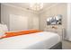 Cozy bedroom featuring a full-size bed, ample closet space, and lots of natural light at 8964 Takeaway Way, Davenport, FL 33896