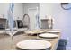 Eat-in kitchen featuring stainless steel appliances, modern cabinets, and space for counter seating at 8964 Takeaway Way, Davenport, FL 33896