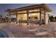Elegant outdoor pool bar with seating and lounge chairs by the pool at 8964 Takeaway Way, Davenport, FL 33896