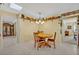 Bright kitchen with tile floors, adjacent to the dining area, and convenient access to other rooms at 1115 Lake Francis Dr, Apopka, FL 32712