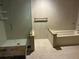 Bathroom with a glass enclosed shower and tub with tile surround, and a modern vanity at 116 Oakmont Ln, New Smyrna Beach, FL 32168