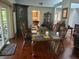 Elegant dining room perfect for gatherings with hardwood floors and ample seating at 116 Oakmont Ln, New Smyrna Beach, FL 32168