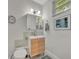 Bright bathroom with modern vanity, sleek fixtures, and stylish mirror at 1161 Dot Dr, Altamonte Springs, FL 32714