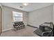 Comfortable bedroom with neutral carpet, a window with a printed valance, and ample space for relaxation and productivity at 1161 Dot Dr, Altamonte Springs, FL 32714