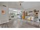 Modern kitchen with white cabinetry, stainless steel appliances, and laminate flooring at 1161 Dot Dr, Altamonte Springs, FL 32714
