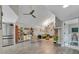Spacious living room featuring high ceilings, unique decor, and a blend of modern and classic furniture at 1161 Dot Dr, Altamonte Springs, FL 32714