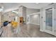 Open living space with vaulted ceilings, stone fireplace, and modern flooring at 1161 Dot Dr, Altamonte Springs, FL 32714