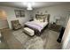 Luxurious bedroom with a large bed, soft lighting, and elegant decor at 1193 Catskill Dr, Haines City, FL 33844