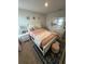 Serene bedroom with a stylish bed, soft lighting, and elegant decor at 1193 Catskill Dr, Haines City, FL 33844