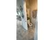 Small half-bathroom with a toilet and decorative accents near the dining area at 1193 Catskill Dr, Haines City, FL 33844