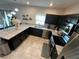 Well-designed kitchen with stainless steel appliances and ample counter space at 1193 Catskill Dr, Haines City, FL 33844