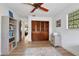 The home office includes a large closet with louvered doors, wood-look floors, and a bright window at 127 Oak Ln, Ormond Beach, FL 32174