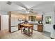 Traditional kitchen with wood cabinets, a movable island, and appliances at 127 Oak Ln, Ormond Beach, FL 32174