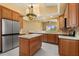 Spacious kitchen with stainless steel appliances and a center island at 14 Camino Real Blvd # 14, Howey In The Hills, FL 34737