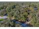 Overhead view of a treed building lot nestled within a quiet, secluded neighborhood at 140 Sweet Bay Cir, Lake Mary, FL 32746