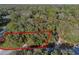 Overhead view of a treed building lot nestled within a quiet, secluded neighborhood at 140 Sweet Bay Cir, Lake Mary, FL 32746