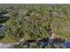 Overhead view of a treed building lot nestled within a quiet, secluded neighborhood at 140 Sweet Bay Cir, Lake Mary, FL 32746