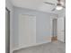 Comfortable bedroom features a ceiling fan, carpet, and a closet with paneled doors at 140 Sweet Bay Cir, Lake Mary, FL 32746