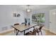 Dining room with modern decor, hardwood floors and natural light at 140 Sweet Bay Cir, Lake Mary, FL 32746