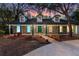 Beautifully maintained brick home features dormer windows, a cozy front porch, and manicured landscaping for serene living at 140 Sweet Bay Cir, Lake Mary, FL 32746