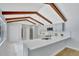 Modern kitchen with white countertops, stainless steel appliances, and wood ceiling beams at 140 Sweet Bay Cir, Lake Mary, FL 32746