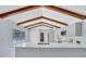 Bright modern kitchen with a view of the pool and stainless steel appliances at 140 Sweet Bay Cir, Lake Mary, FL 32746