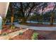 Beautiful landscaping with lush gardens and lighting at 140 Sweet Bay Cir, Lake Mary, FL 32746