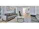 Modern living room featuring hardwood floors, neutral colors and natural light at 140 Sweet Bay Cir, Lake Mary, FL 32746