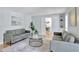 Living room featuring hardwood floors, recessed lighting, and stylish decor at 140 Sweet Bay Cir, Lake Mary, FL 32746