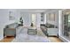 Spacious living room with hardwood floors, recessed lighting and large windows at 140 Sweet Bay Cir, Lake Mary, FL 32746
